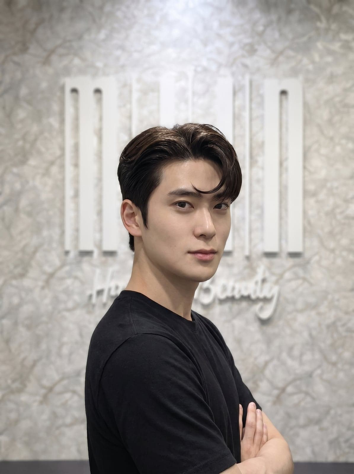 Men hairstyle comma hair with soft curtain fringe